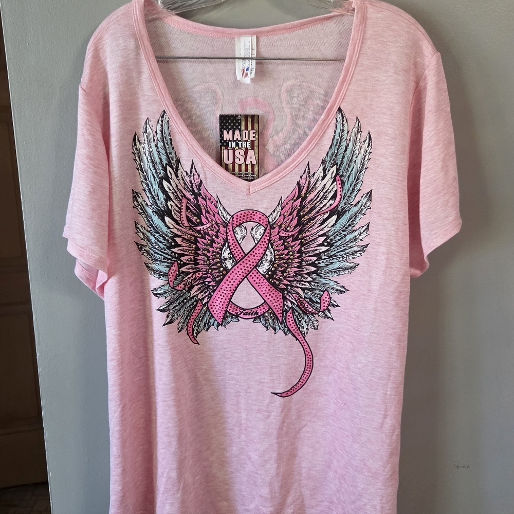 Pink Graphic Tee with Winged Ribbon Design